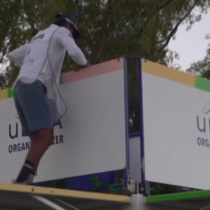 PGA TOUR's Brandon Matthew's Caddie above beer stand at the Zurich Classic. Curated content